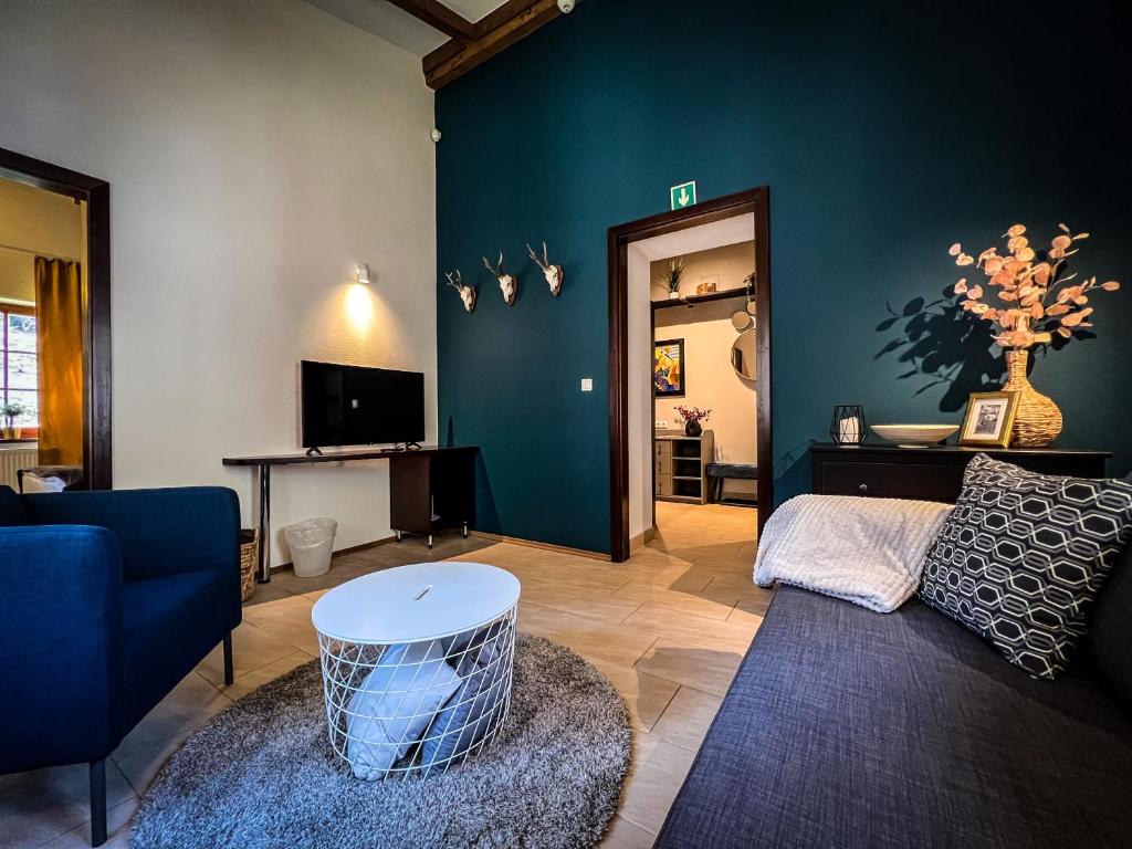 Televízia a/alebo spoločenská miestnosť v ubytovaní Templomvölgy Butik Hotel Mátrakeresztes