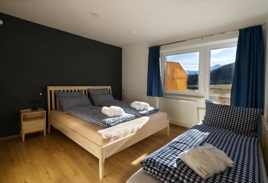 Postel nebo postele na pokoji v ubytování Appartements Wolf