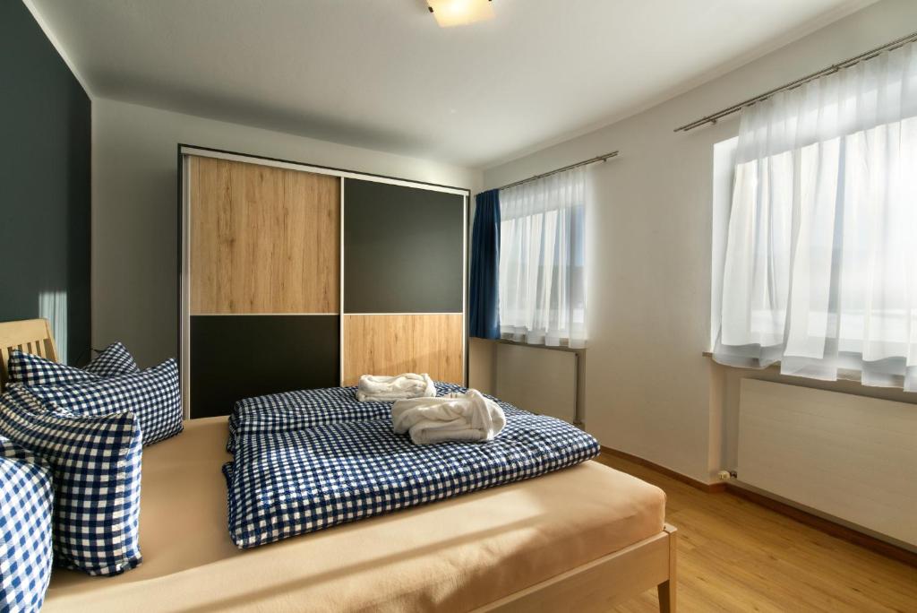 Postel nebo postele na pokoji v ubytování Appartements Wolf