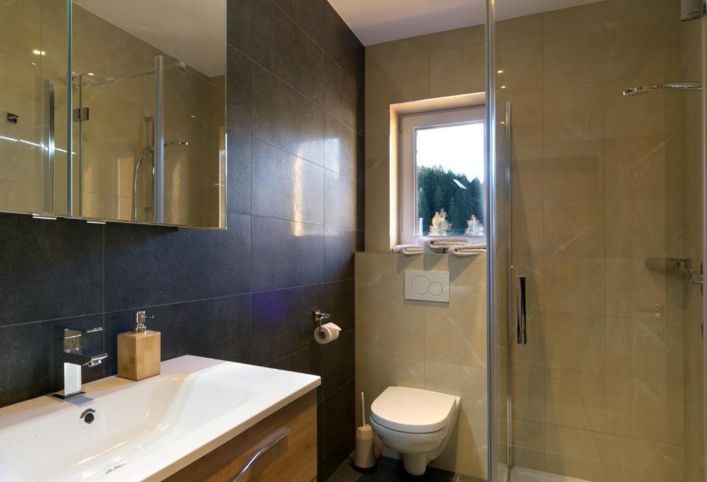 Koupelna v ubytování Appartements Wolf