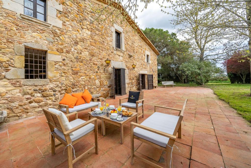 Posezení v ubytování Masia Marco Lux, ideal familias con gran zona exterior y Piscina