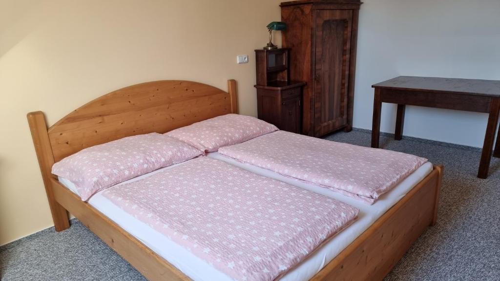 Postel nebo postele na pokoji v ubytování Pension Rondel