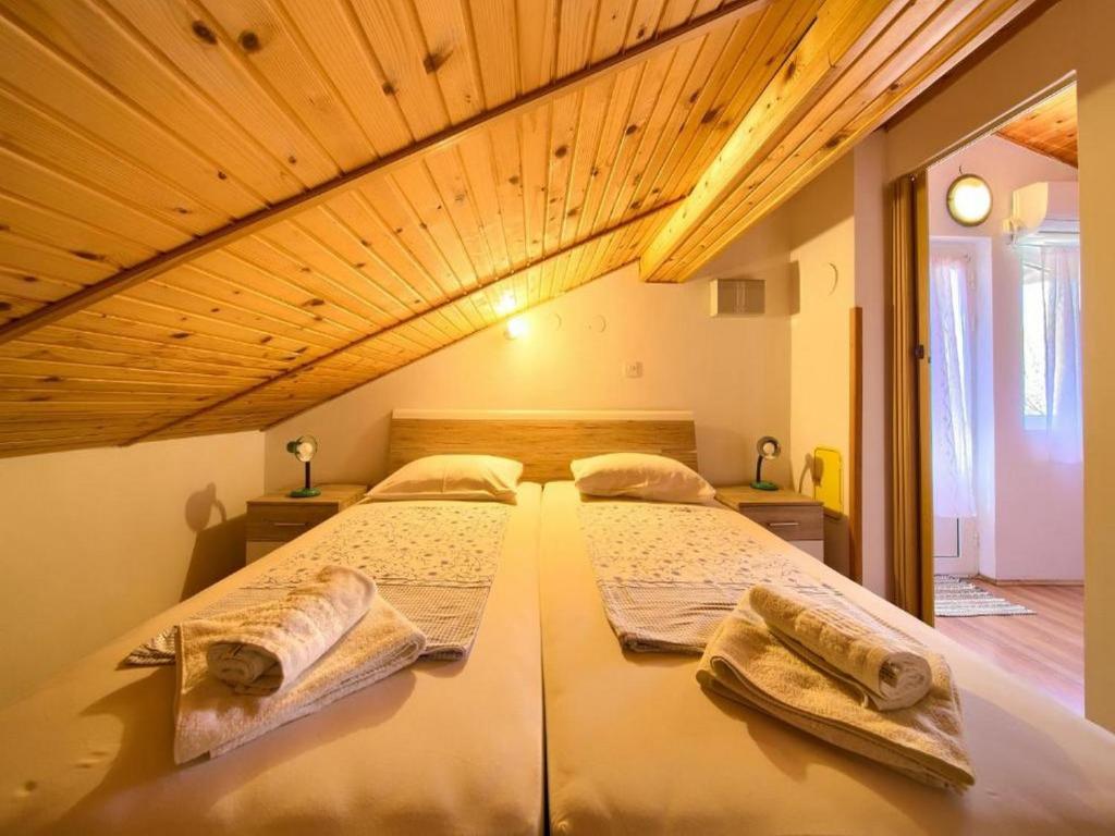 Postel nebo postele na pokoji v ubytování Apartment Ankica