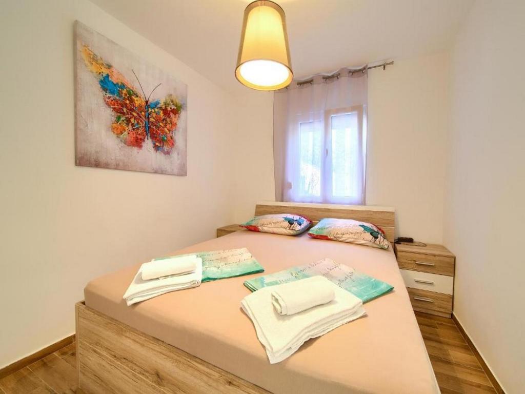 Postel nebo postele na pokoji v ubytování Apartment Ankica