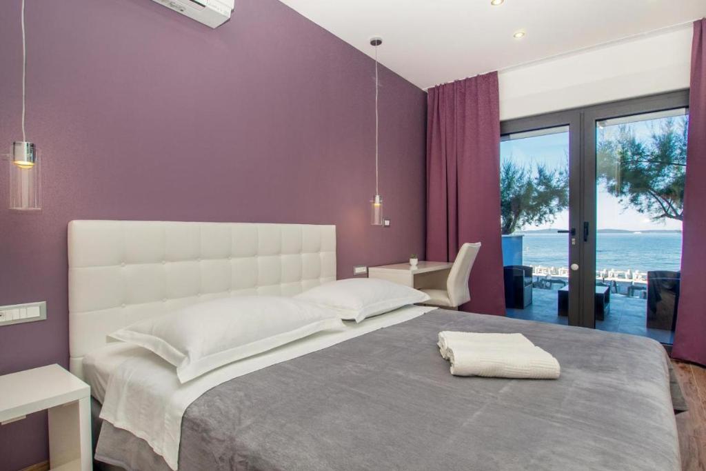 Postel nebo postele na pokoji v ubytování Luxury rooms Beach Mediteran