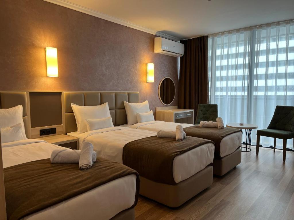 Postel nebo postele na pokoji v ubytování Hotel Kanzler