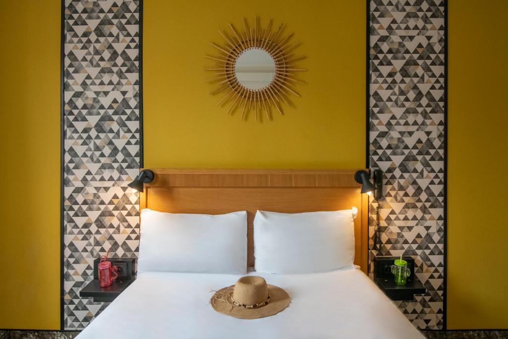 Postel nebo postele na pokoji v ubytování Hotel d'Ostende