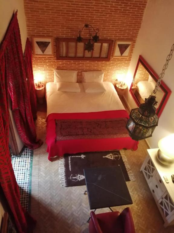 Postel nebo postele na pokoji v ubytování Les Bains de Fez Tara