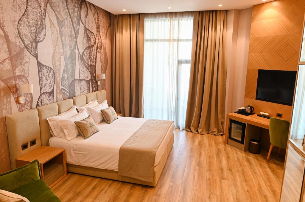TV a/nebo společenská místnost v ubytování White Hill Hotel, SPA & Conferences
