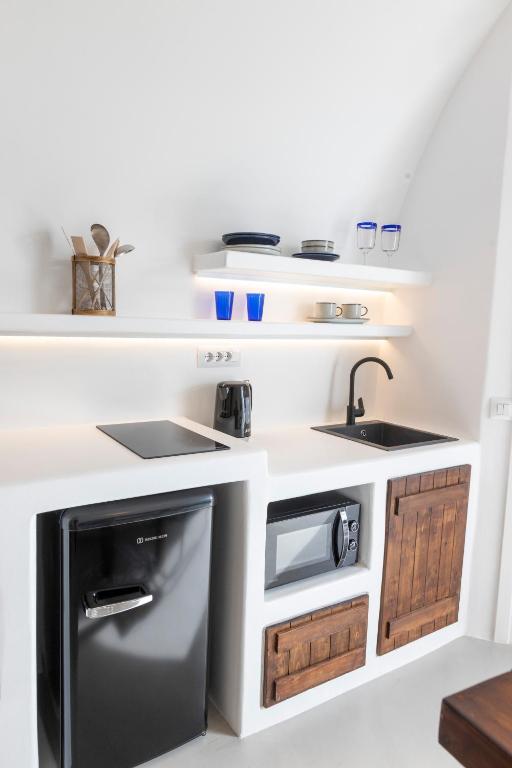 Una cocina o zona de cocina en Delta Suites