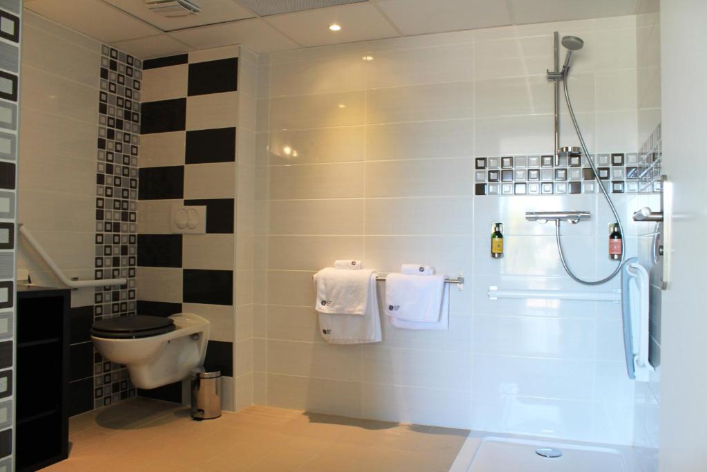 Koupelna v ubytování Rives d'Or Hôtel