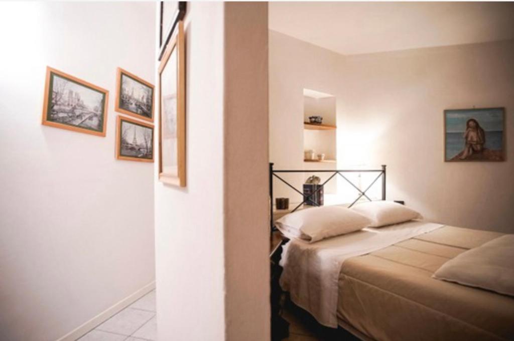 Posteľ alebo postele v izbe v ubytovaní Casa vacanze Cinzia