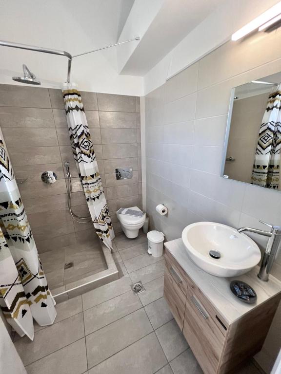 Koupelna v ubytování Firaxenia rooms