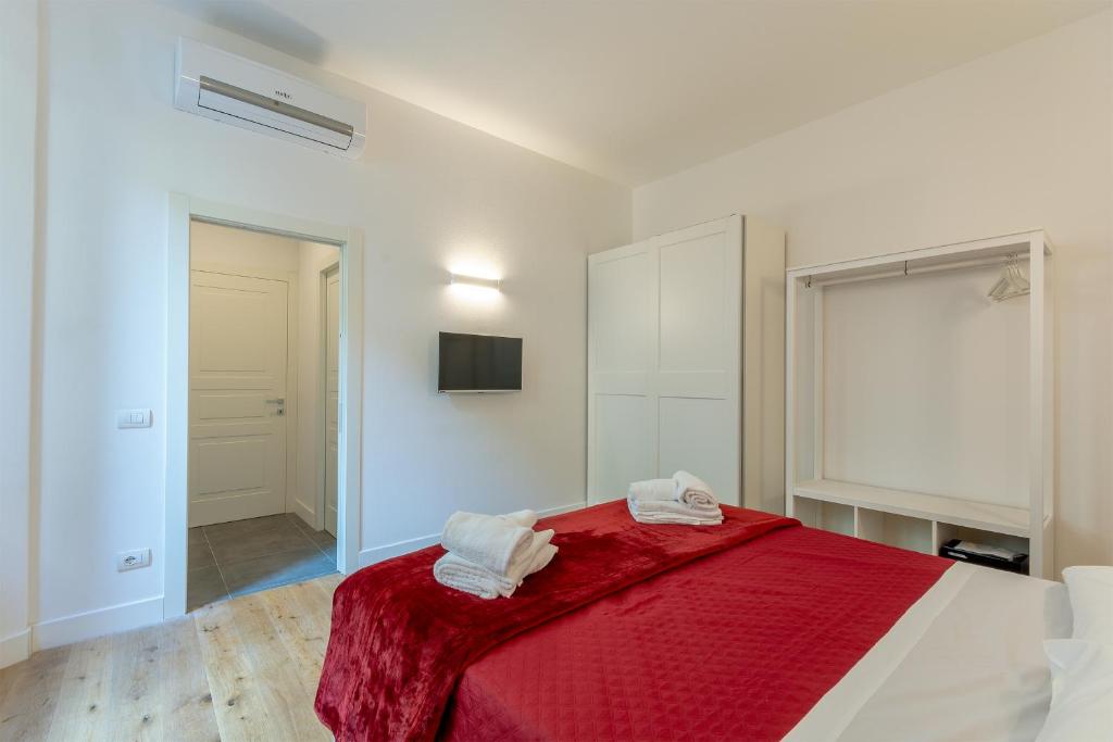 Posteľ alebo postele v izbe v ubytovaní Florence Michelangelo Suite Apartment