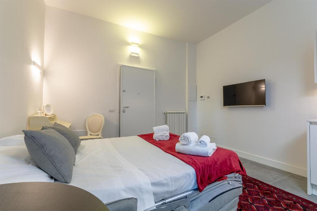 Posteľ alebo postele v izbe v ubytovaní Florence Michelangelo Suite Apartment
