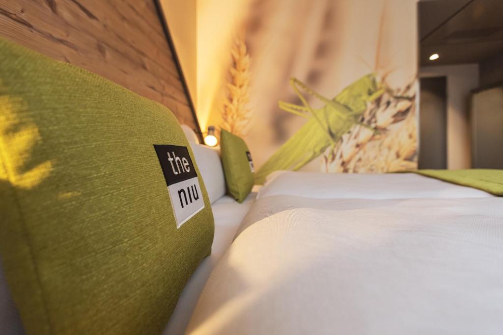 Postel nebo postele na pokoji v ubytování Holiday Inn - the niu, Mill Cologne Mülheim by IHG