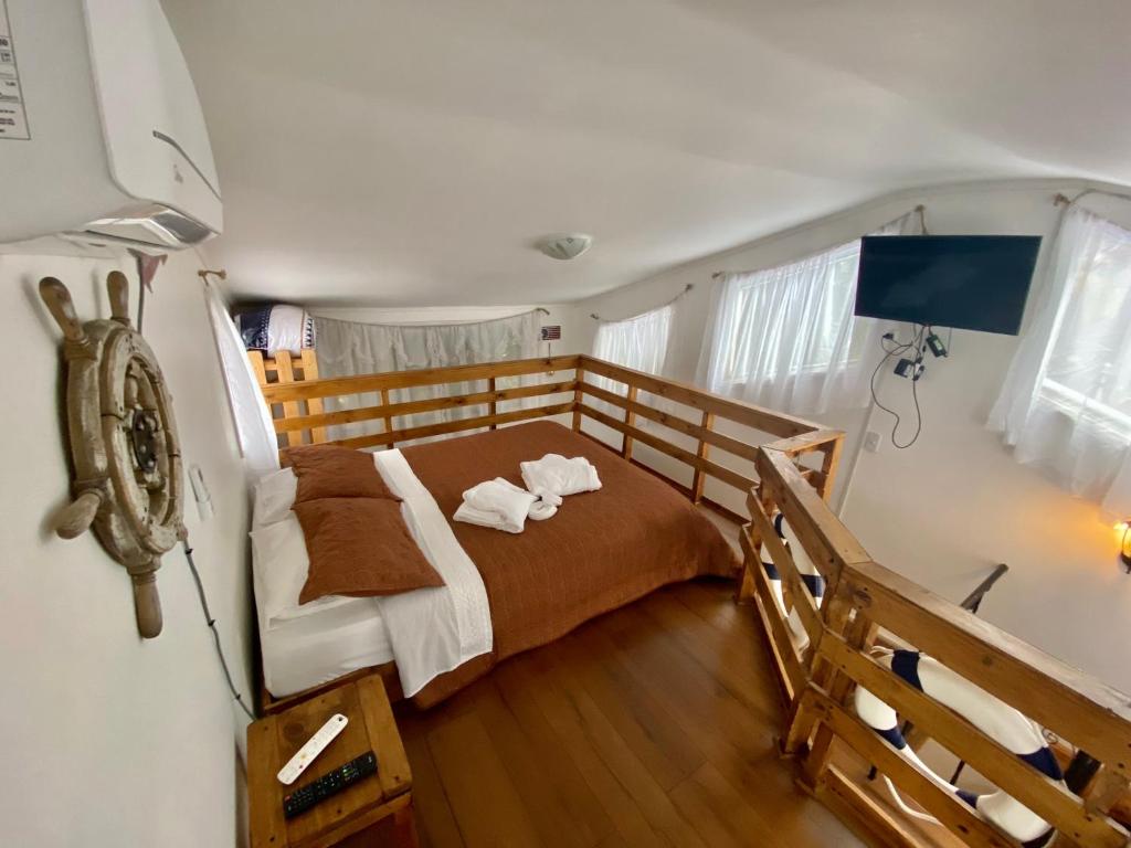 Postel nebo postele na pokoji v ubytování El Encanto del Manzano & Espacio Vittalia Spa