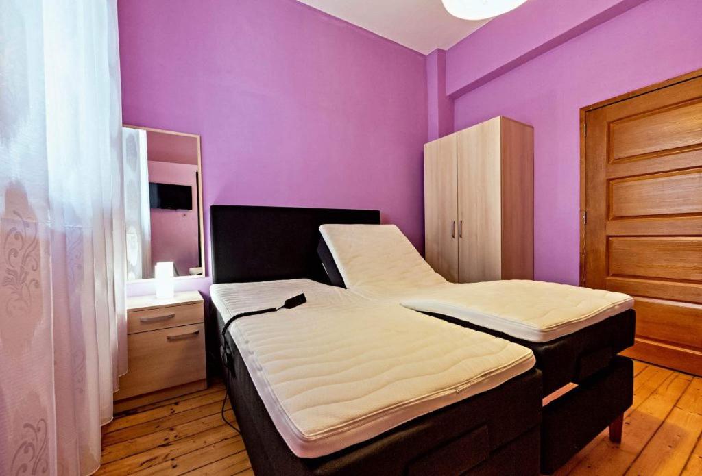 A bed or beds in a room at Villa Dryanovo