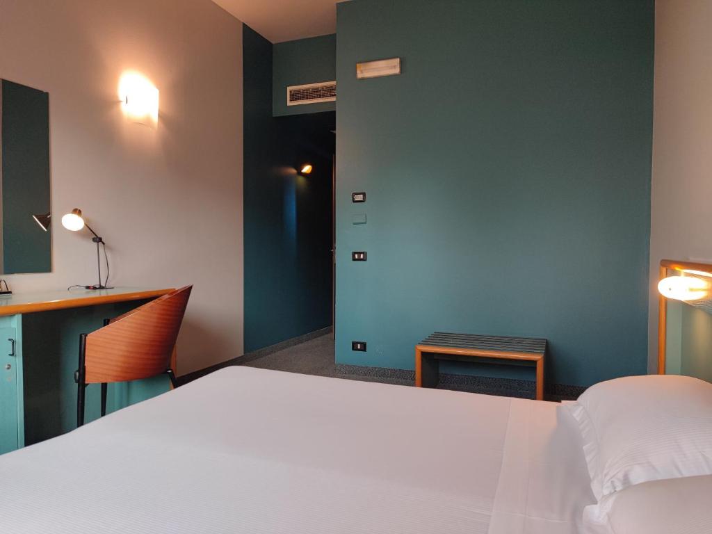 Postel nebo postele na pokoji v ubytování Stay Hotel