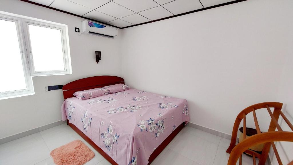 Ένα ή περισσότερα κρεβάτια σε δωμάτιο στο Little Cottage Villa