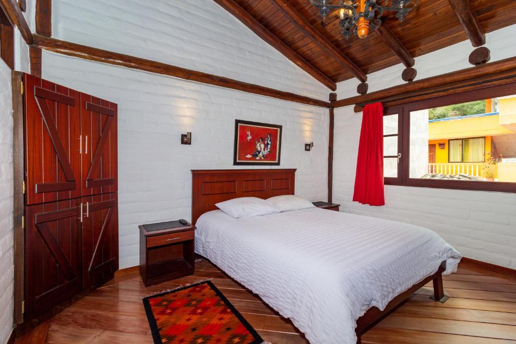 Postel nebo postele na pokoji v ubytování Hotel ILÉ
