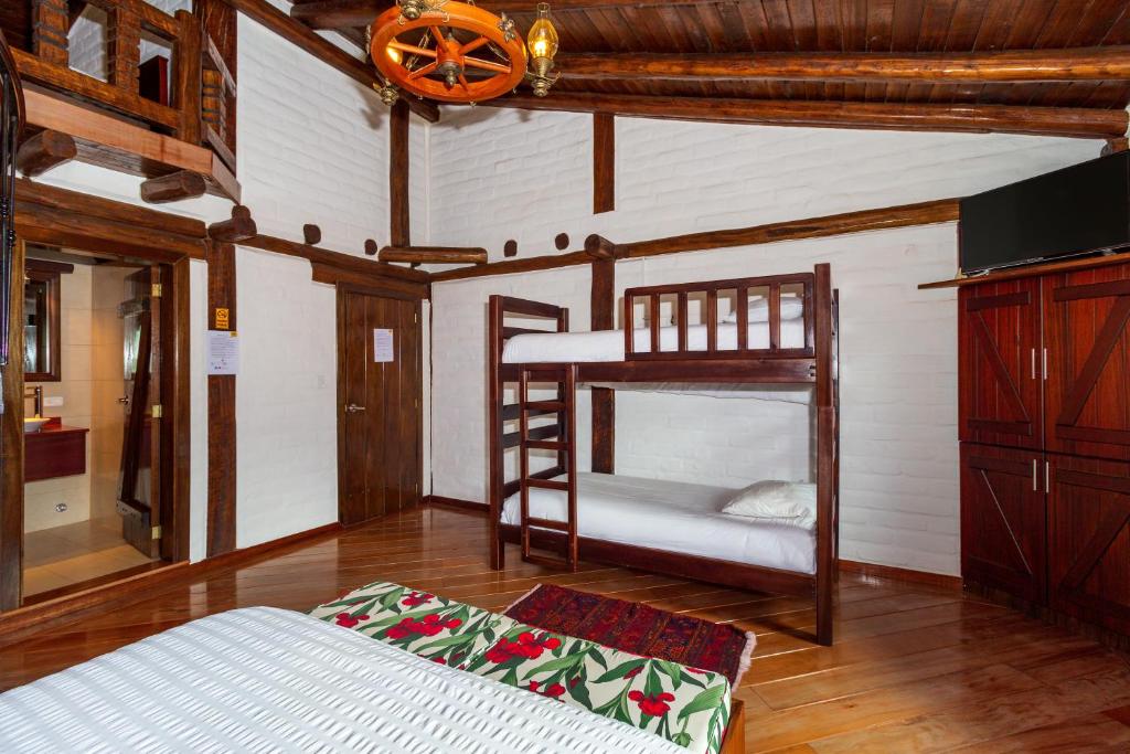 Postel nebo postele na pokoji v ubytování Hotel ILÉ