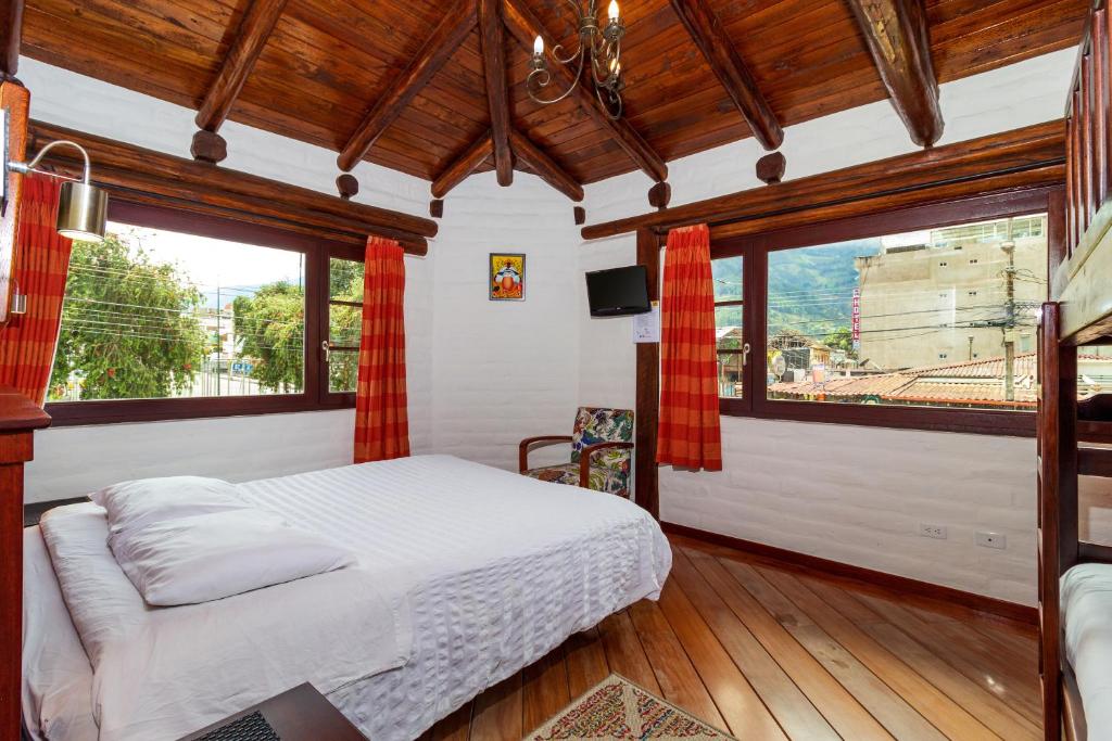 Postel nebo postele na pokoji v ubytování Hotel ILÉ