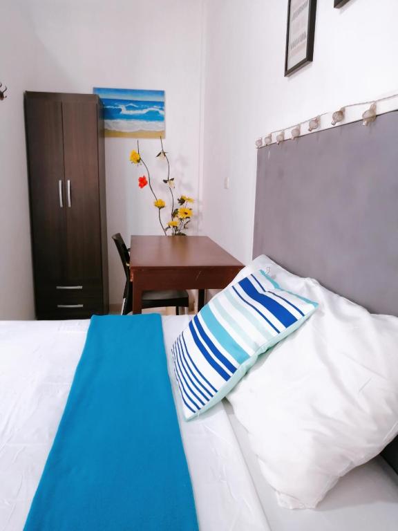 Postel nebo postele na pokoji v ubytování Vista Palmeras