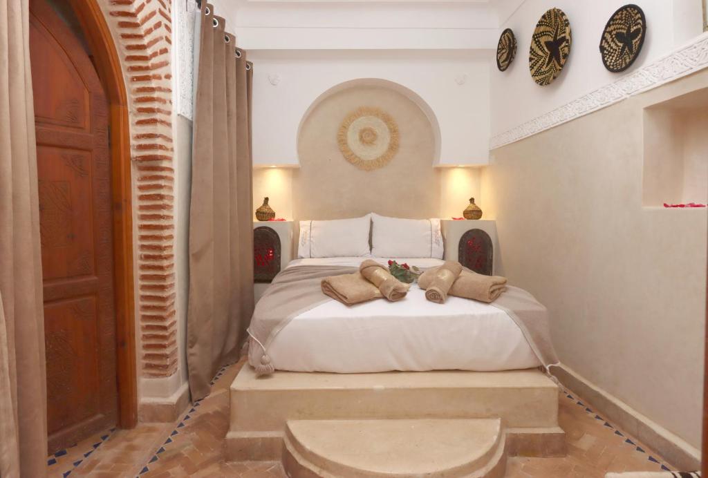 Postel nebo postele na pokoji v ubytování Riad Venezia