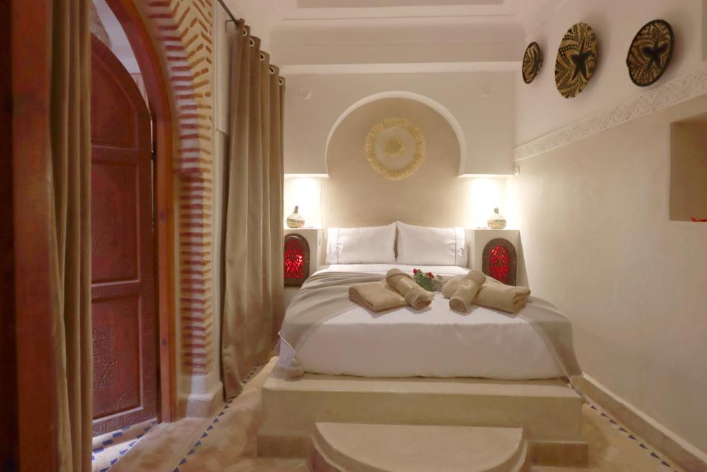 Postel nebo postele na pokoji v ubytování Riad Venezia