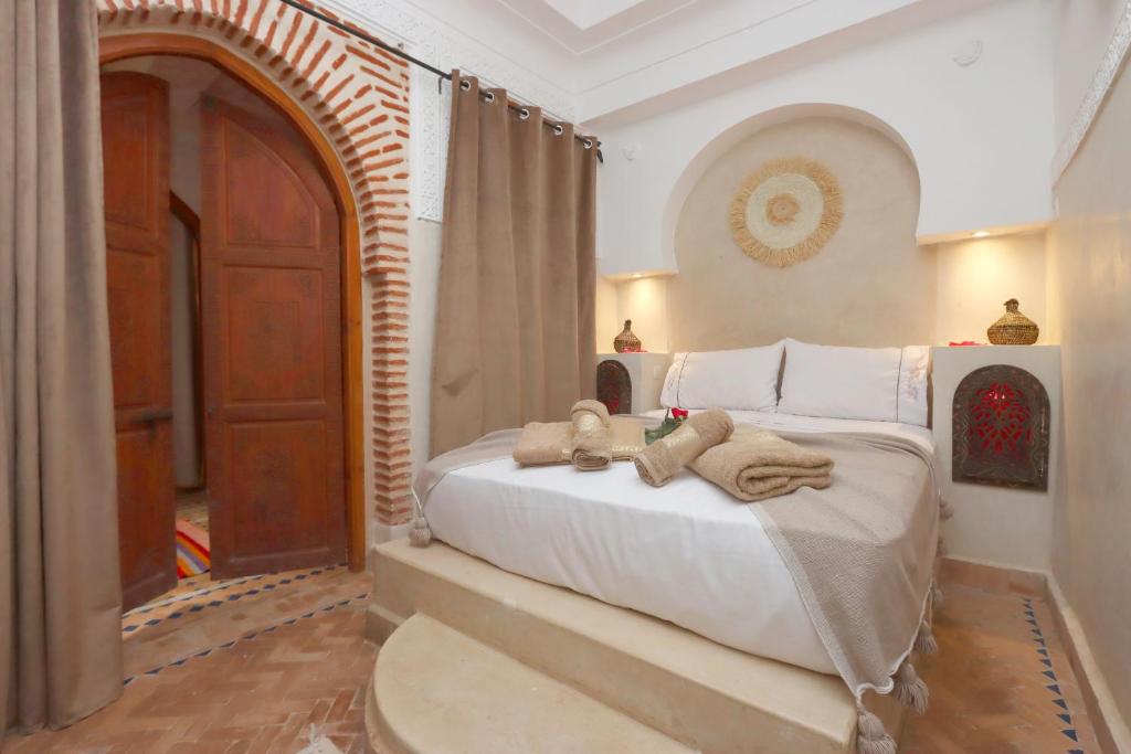 Postel nebo postele na pokoji v ubytování Riad Venezia