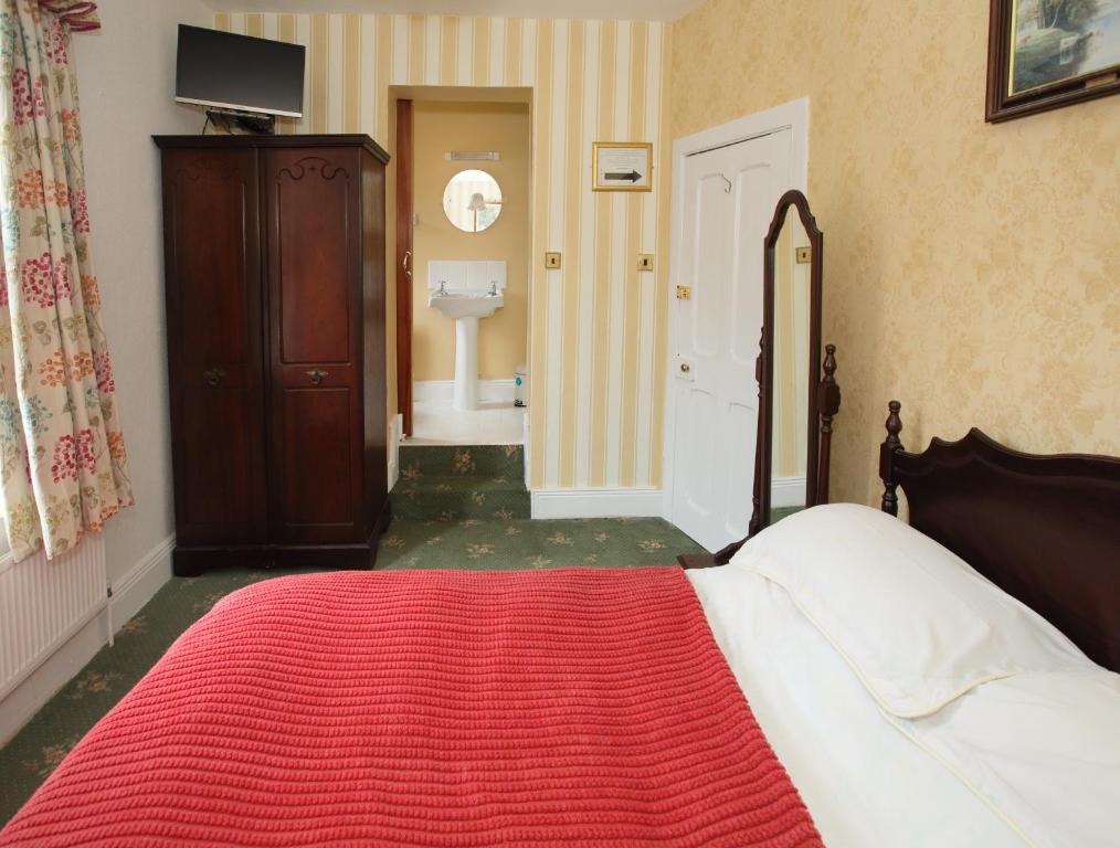 Postel nebo postele na pokoji v ubytování Gleneven Guest House