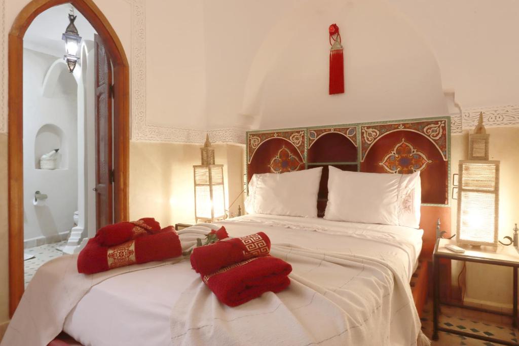 Postel nebo postele na pokoji v ubytování Riad Venezia