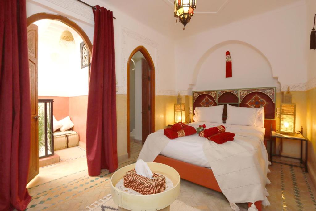 Postel nebo postele na pokoji v ubytování Riad Venezia