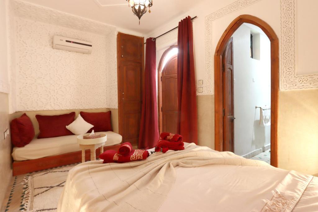 Postel nebo postele na pokoji v ubytování Riad Venezia