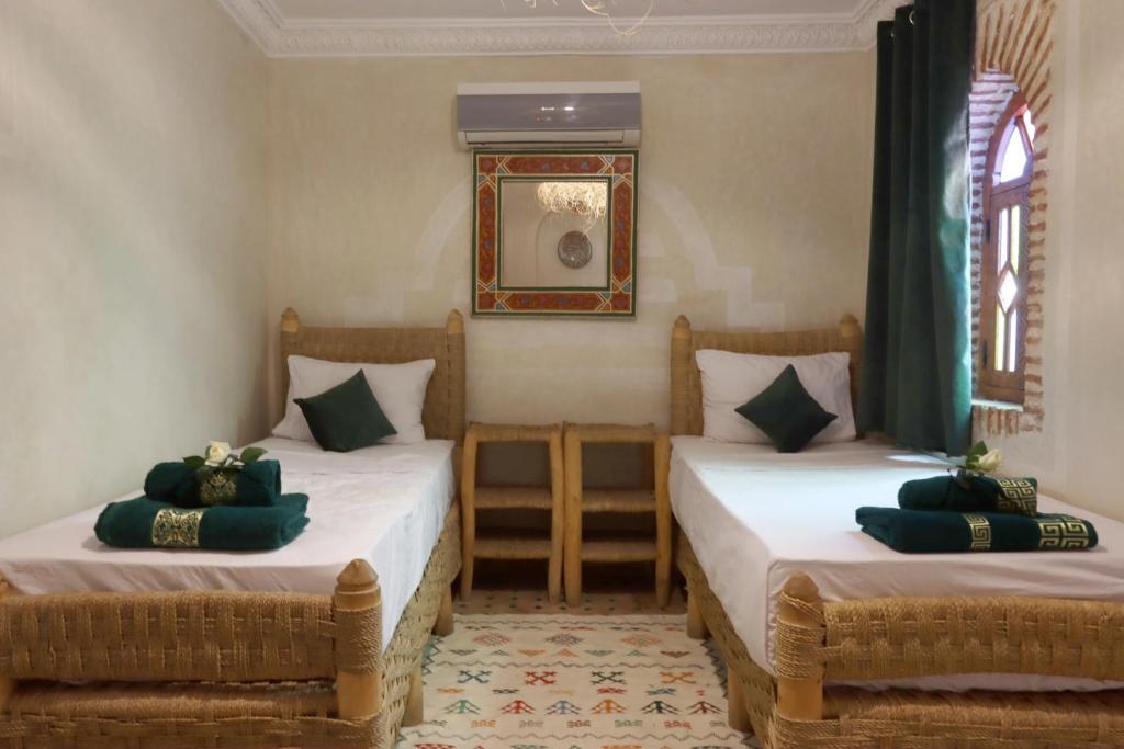 Postel nebo postele na pokoji v ubytování Riad Venezia