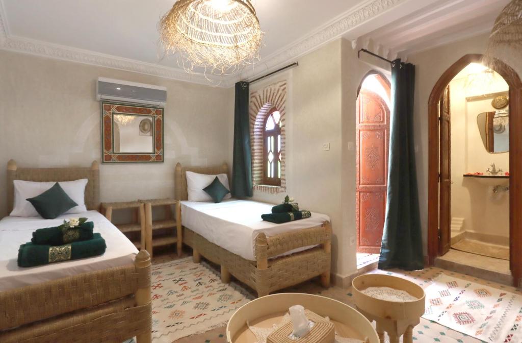 Postel nebo postele na pokoji v ubytování Riad Venezia