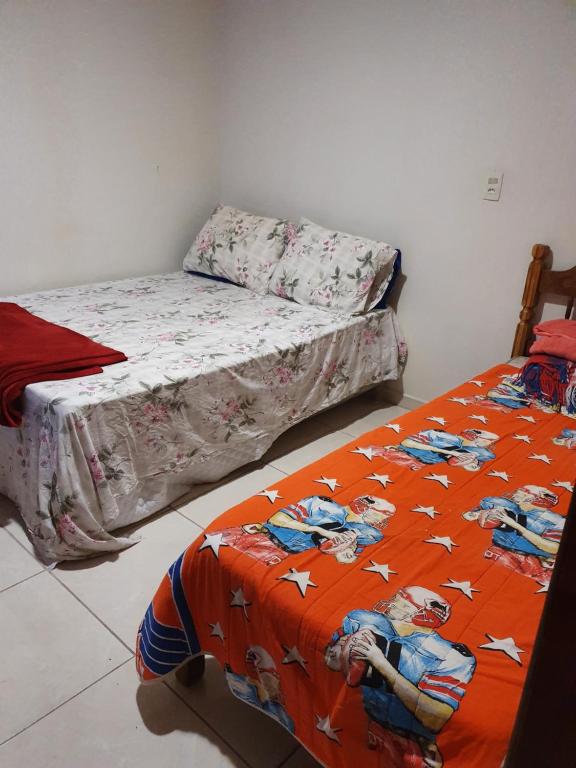 QUARTO TEMPORADA CARAGUATATUBA - Housity
