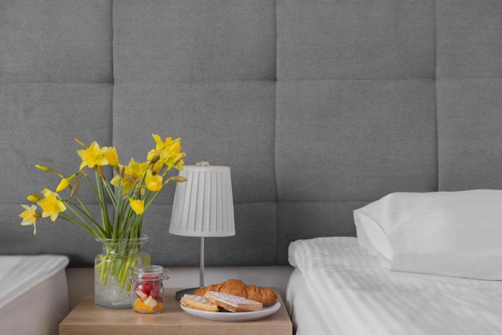 Postel nebo postele na pokoji v ubytování Baltic Hotel