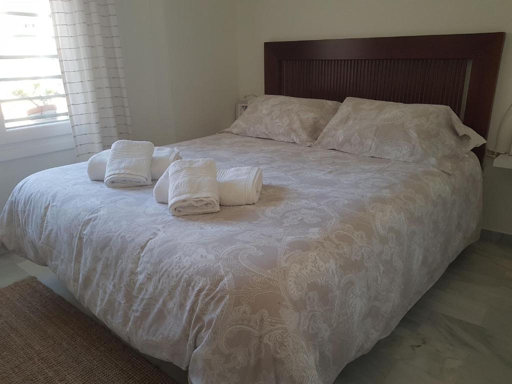 Posteľ alebo postele v izbe v ubytovaní Apartamento "La Viña"