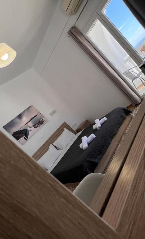 TV a/nebo společenská místnost v ubytování Firaxenia rooms