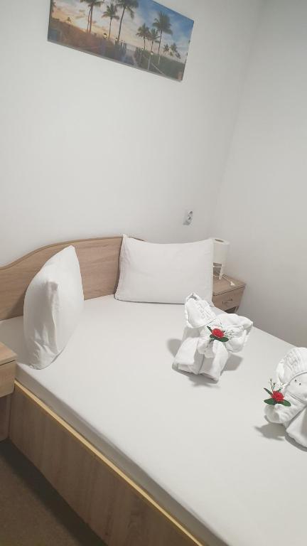 Postel nebo postele na pokoji v ubytování Casa Nicholas