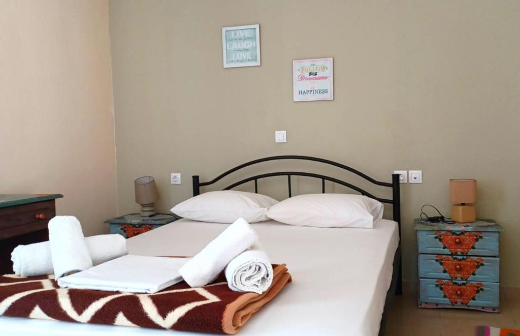 Postel nebo postele na pokoji v ubytování En Plo Studios & Apartments