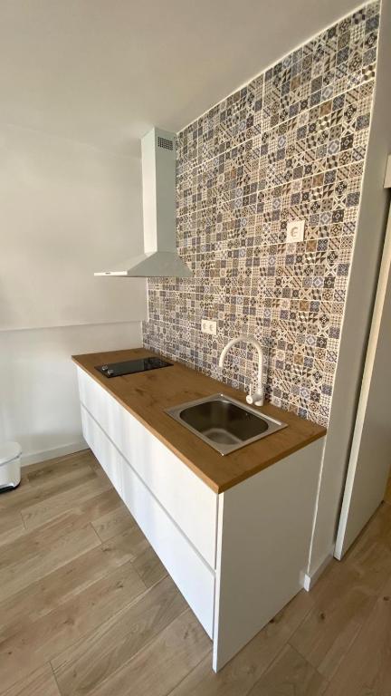 Kuchyň nebo kuchyňský kout v ubytování Homing La Pineda 117