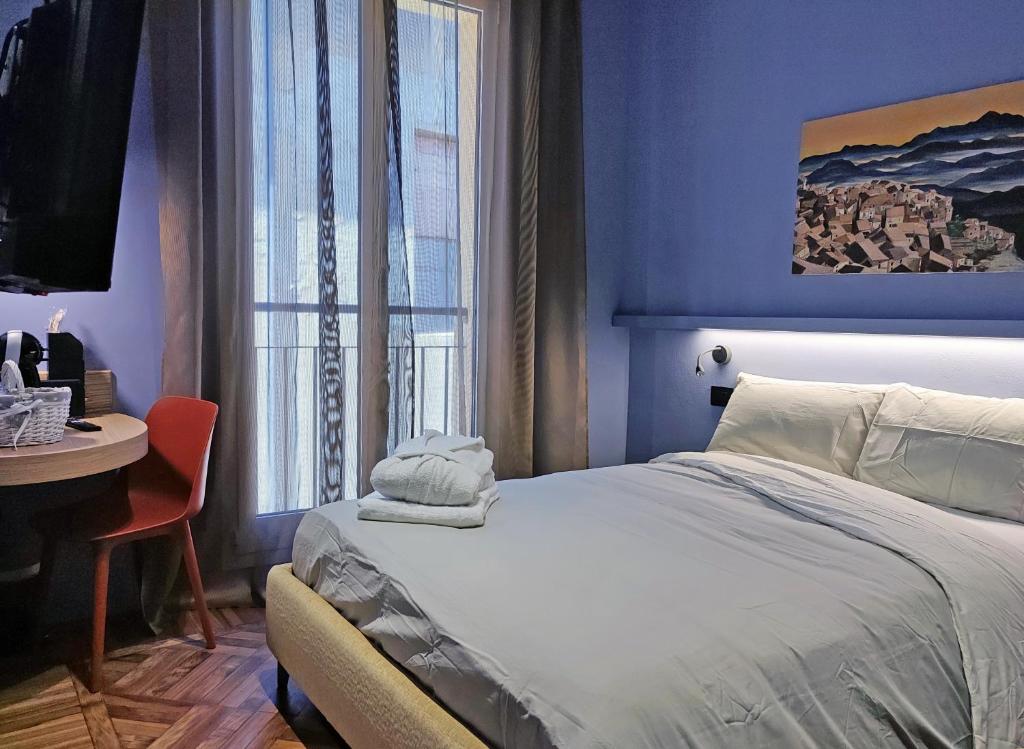Posteľ alebo postele v izbe v ubytovaní Locanda dell'Orsa