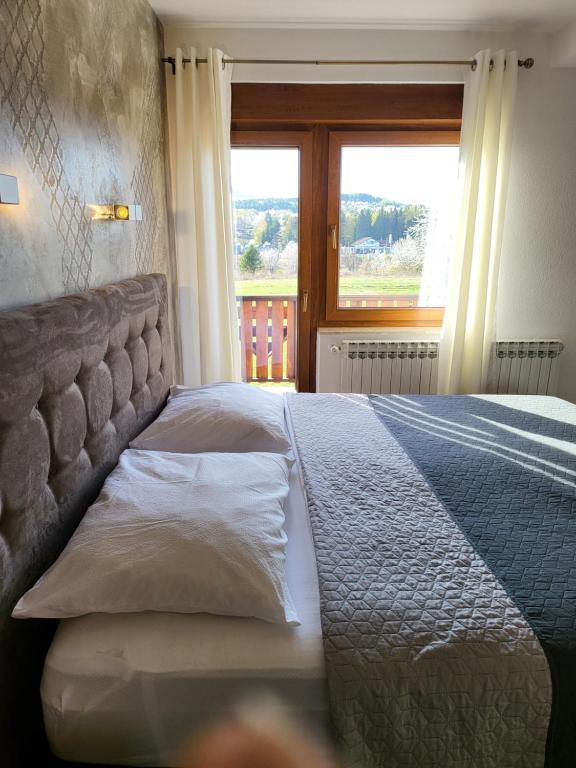 Postel nebo postele na pokoji v ubytování House Tina