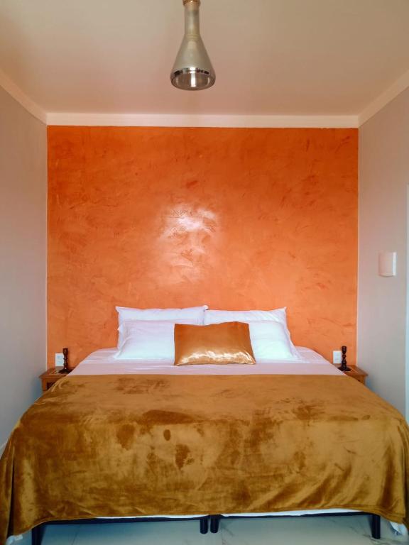 Postel nebo postele na pokoji v ubytování SPA&Hospedagem Giovannini