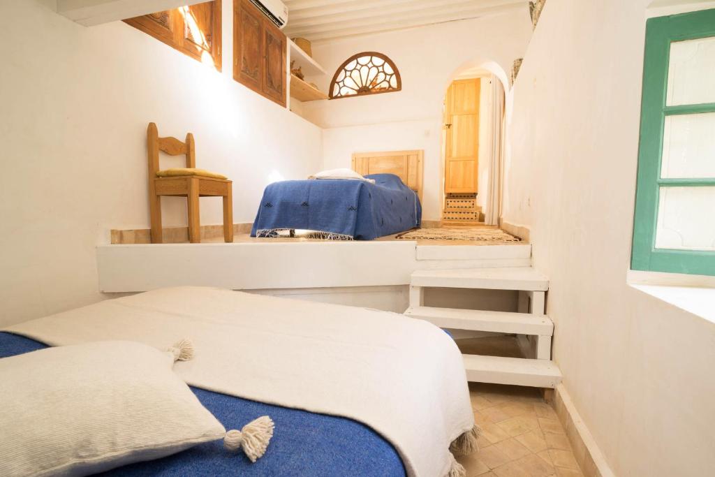 Letto o letti in una camera di Dar Kleta