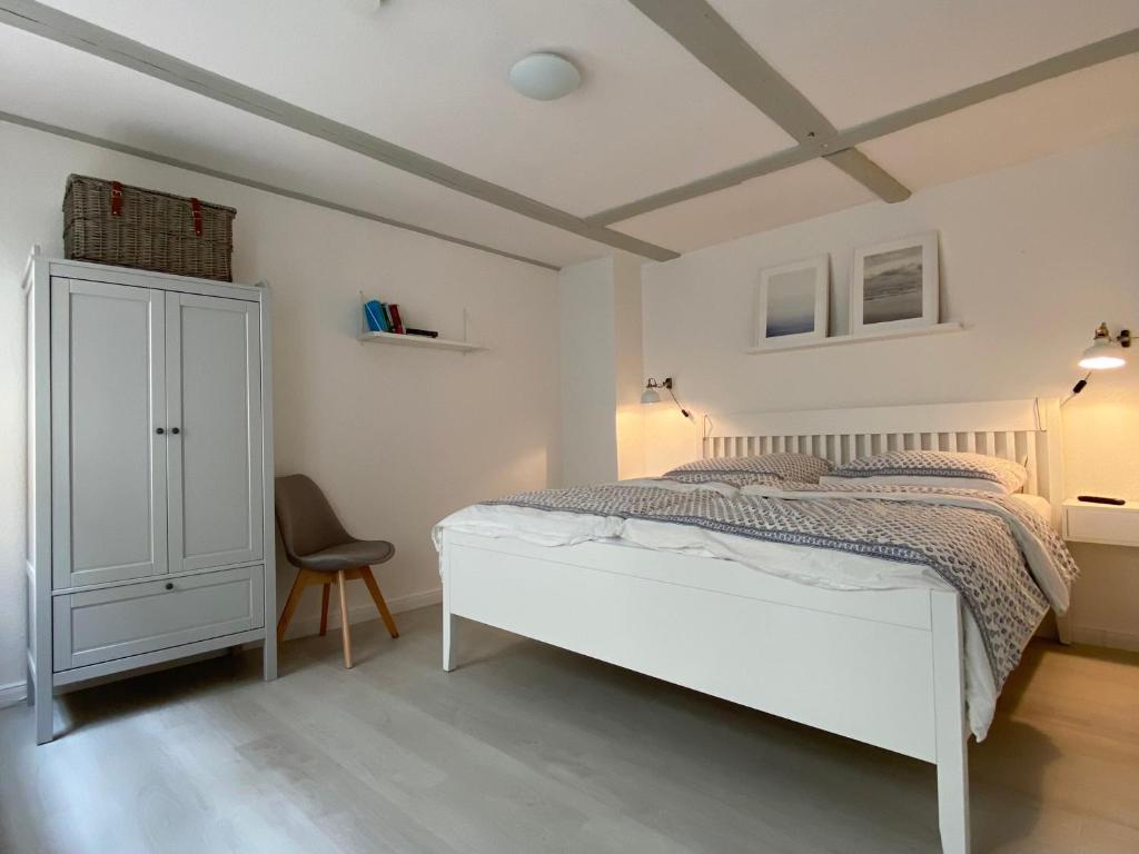 Postel nebo postele na pokoji v ubytování Hafenkoje Husum
