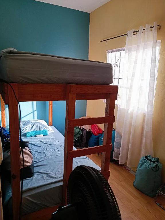 Postel nebo postele na pokoji v ubytování Hostal a 10 min del centro de Veracruz